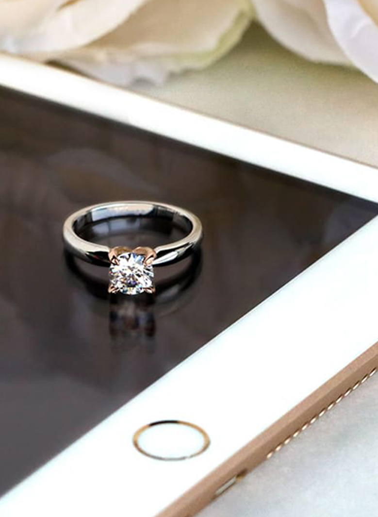 A round cut lab grown diamond engagement ring